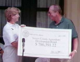 Presenting check for farm land preservation